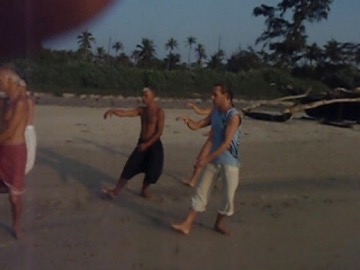 Teaching Tai-Chi on the beach in India (Goa)